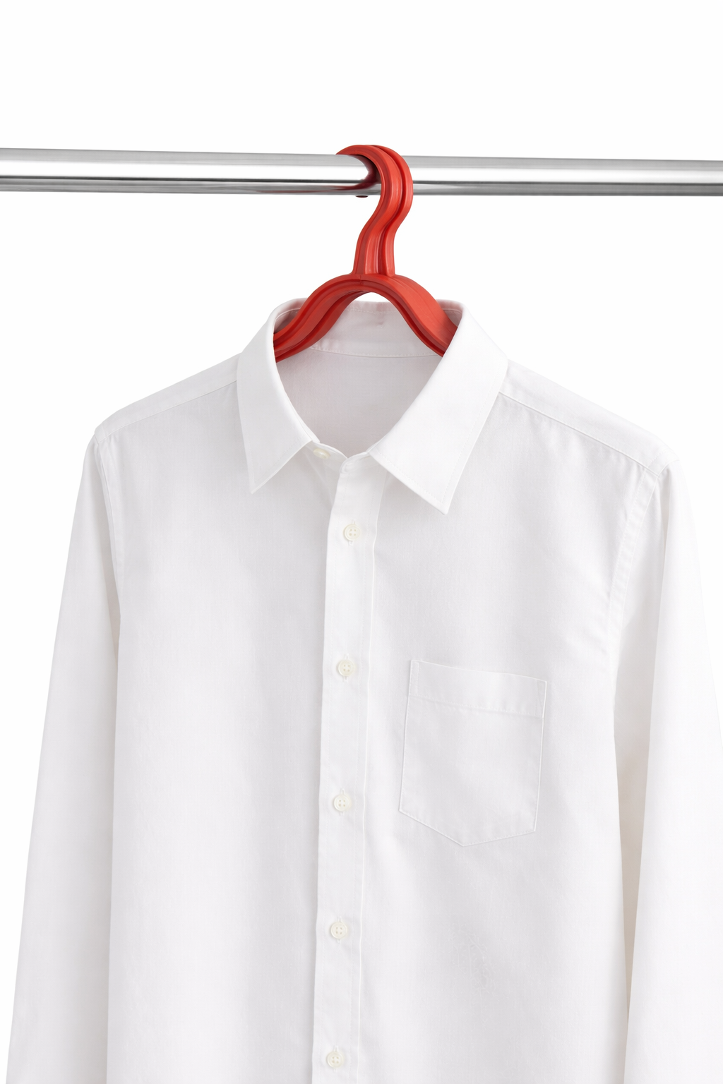 White shirt on a red hanger against a white background